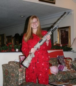 Allie and her gun...one day it will be mom's old gun instead of dad's old gun